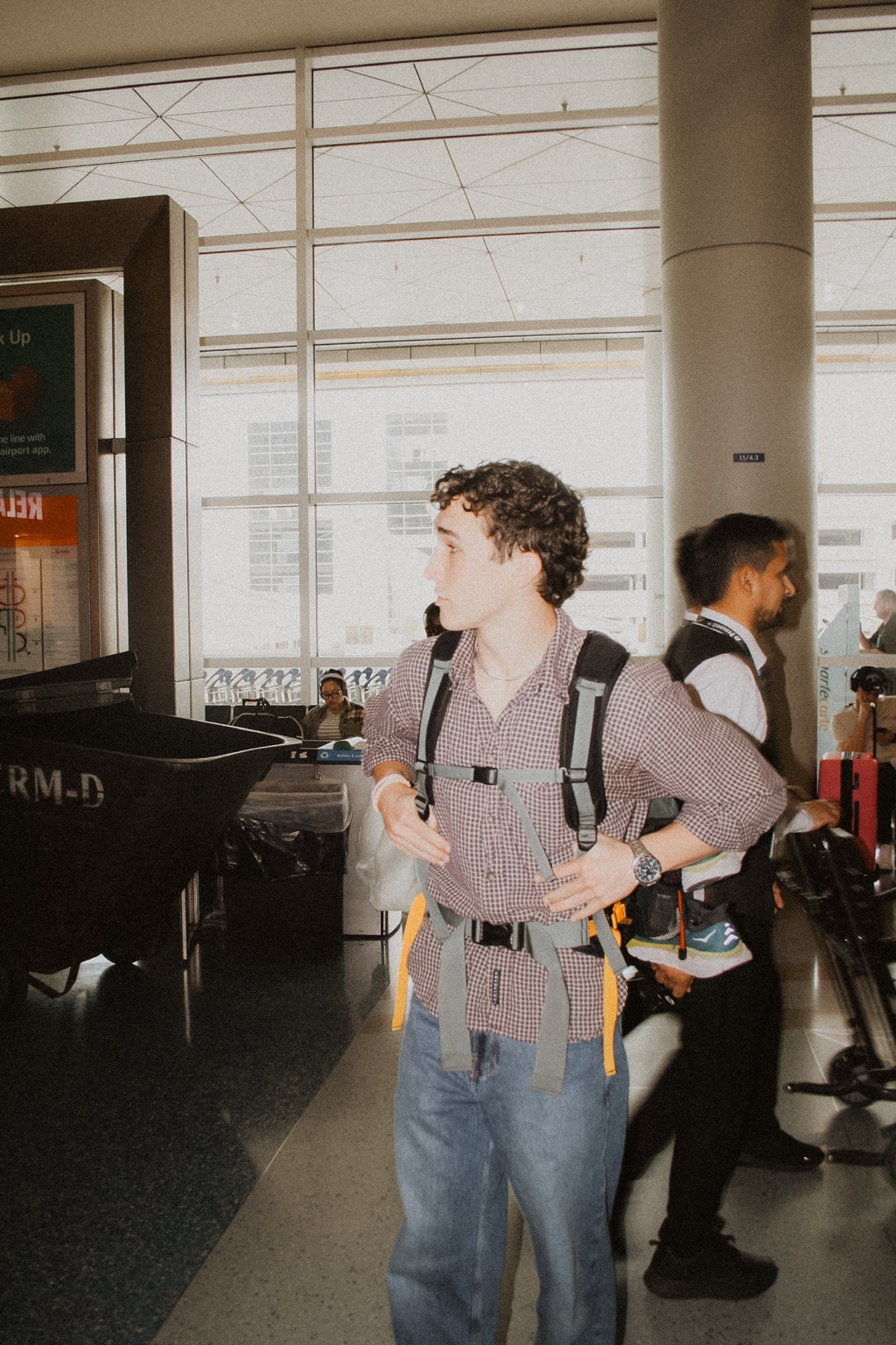 Airport portrait in a checkered shirt