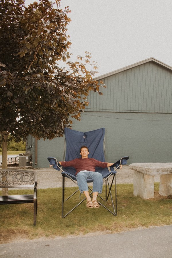Casual seated portrait outdoors
